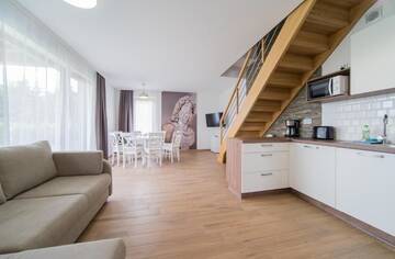 Фото номера Двухуровневые апартаменты Дома для отпуска Villa Arkadia RESORT г. Лукенцин 4