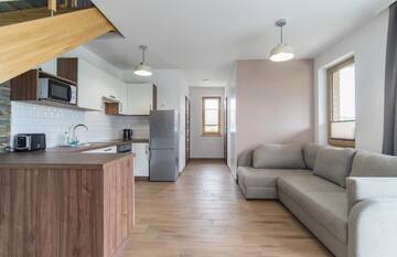 Фото номера Двухуровневые апартаменты Дома для отпуска Villa Arkadia RESORT г. Лукенцин 7