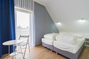 Фото номера Двухуровневые апартаменты Дома для отпуска Villa Arkadia RESORT г. Лукенцин 14