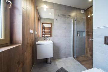 Фото номера Двухуровневые апартаменты Дома для отпуска Villa Arkadia RESORT г. Лукенцин 11