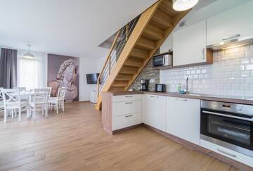 Фото номера Двухуровневые апартаменты Дома для отпуска Villa Arkadia RESORT г. Лукенцин 8