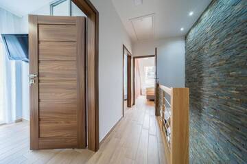 Фото номера Двухуровневые апартаменты Дома для отпуска Villa Arkadia RESORT г. Лукенцин 13