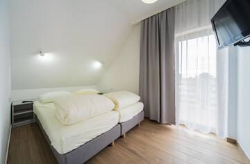 Фото номера Двухуровневые апартаменты Дома для отпуска Villa Arkadia RESORT г. Лукенцин 16