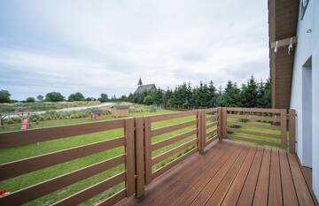 Фото номера Двухуровневые апартаменты Дома для отпуска Villa Arkadia RESORT г. Лукенцин 18