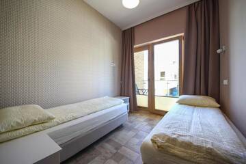 Фото номера Апартаменты с 3 спальнями Апартаменты Villa Arkadia MARE г. Лукенцин 11